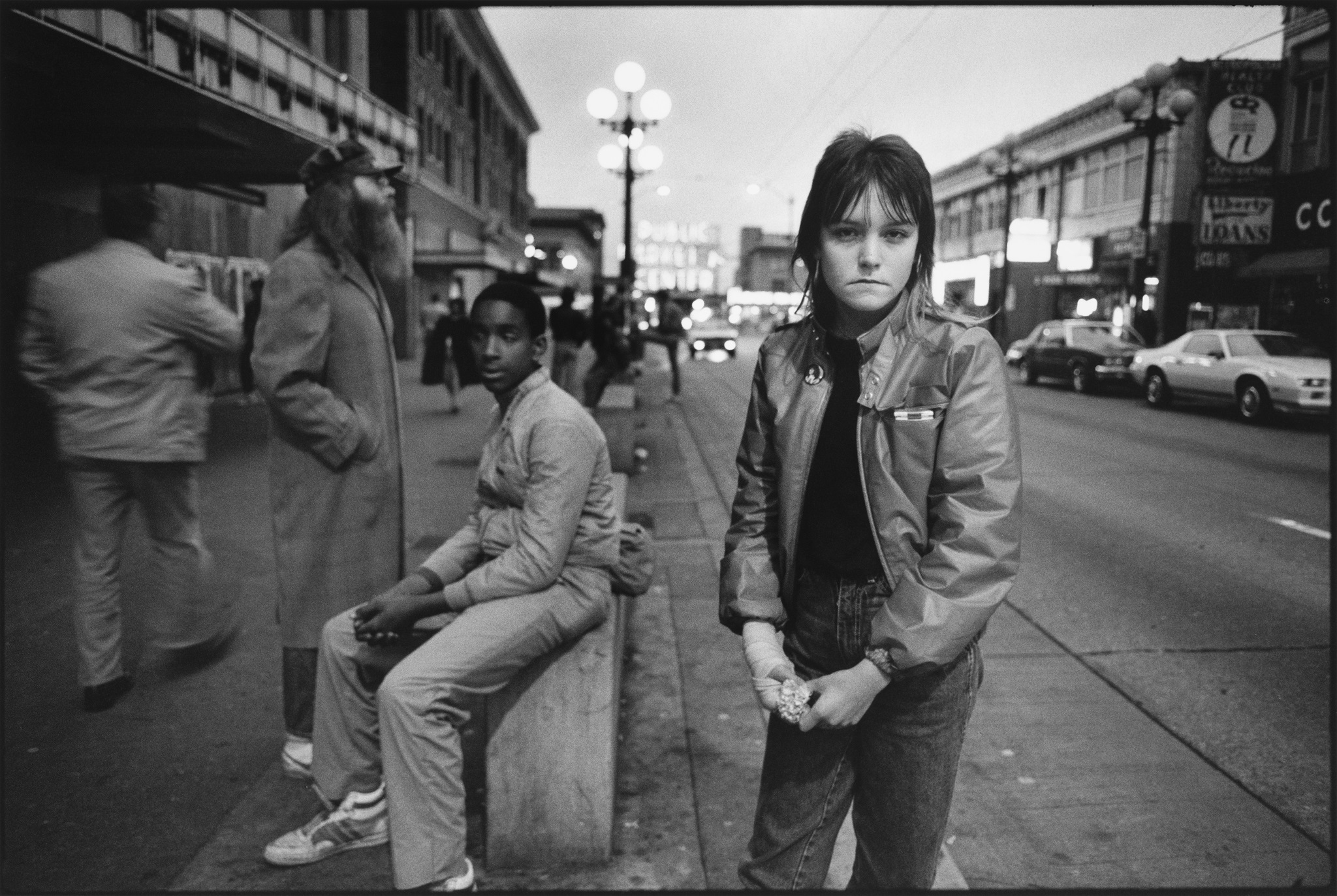 Erin (who goes by her street name “Tiny”) on Pike Street, Seattle, 1983